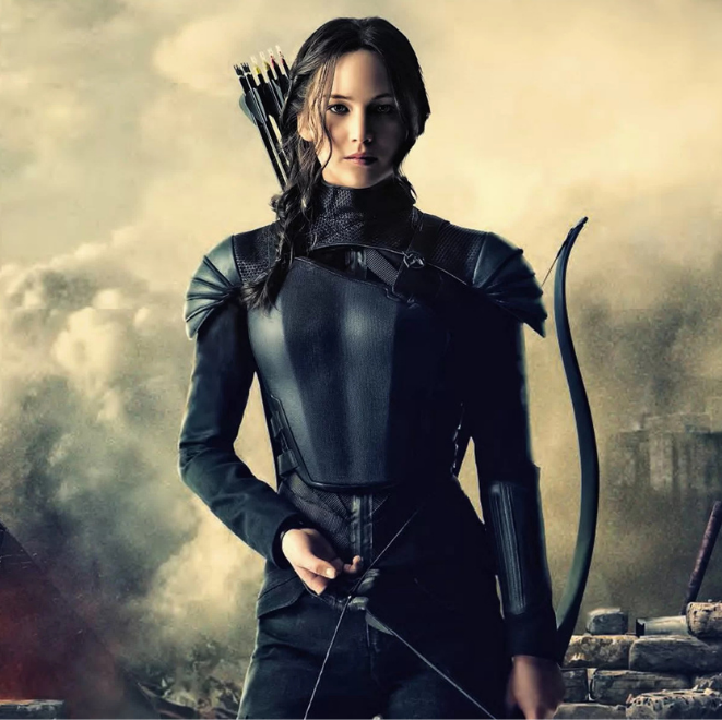 Strong woman in black armour holding a bow with arrows on her back, standing against a smoky, battle-scarred background.